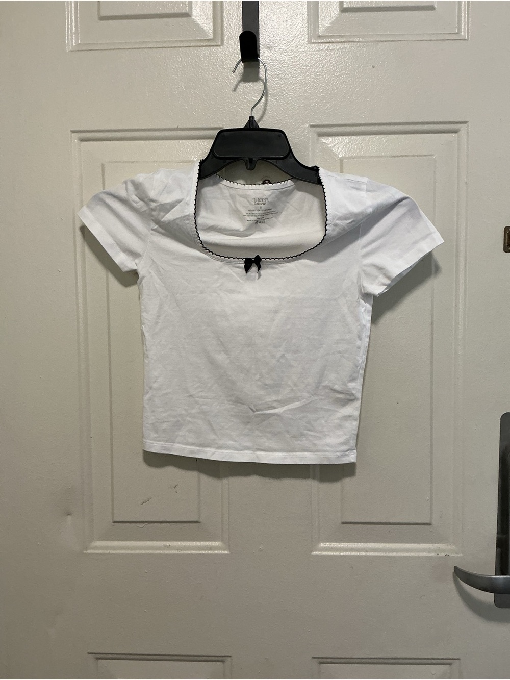 White Short-Sleeve Crop Top with Black Trim and Bow Accent